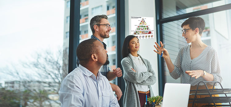 female speaker motivates three team members