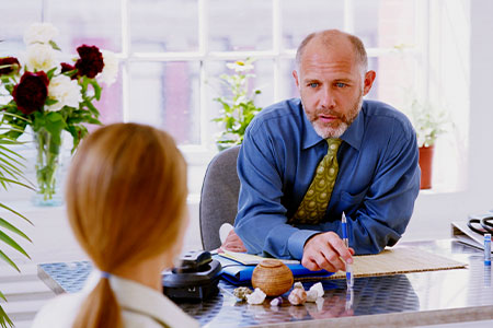 homeopathy professional meeting with client
