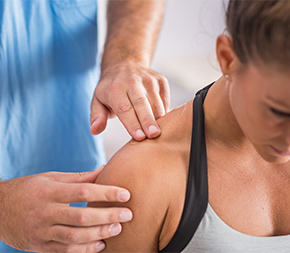 physical therapist with patient