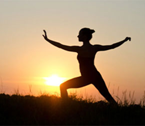 woman doing hellerwork therapy at sunset