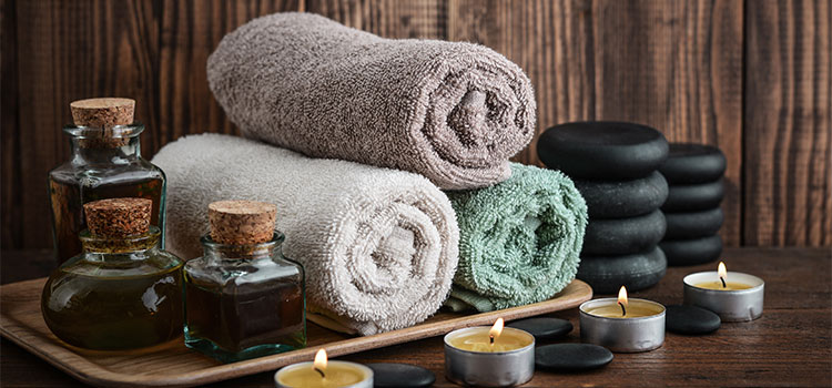 towels oils stones candles in natural health spa