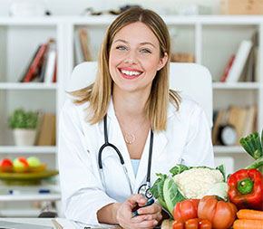 smiling nutritionist in office