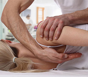 client receiving rolfing therapy treatment