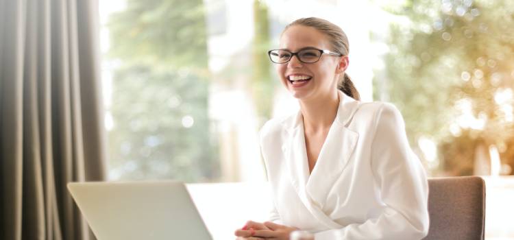 speech pathologist graduate smiling in her new role